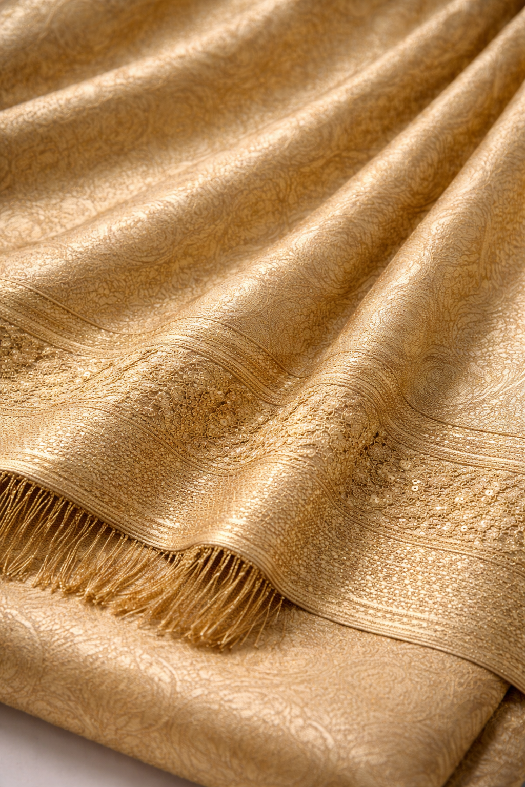 Detail view of Elegant Plain Tissue Saree with Tassels